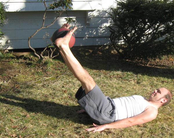 Medicine Ball Straight Leg Raises