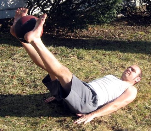 Medicine Ball Straight Leg Raises